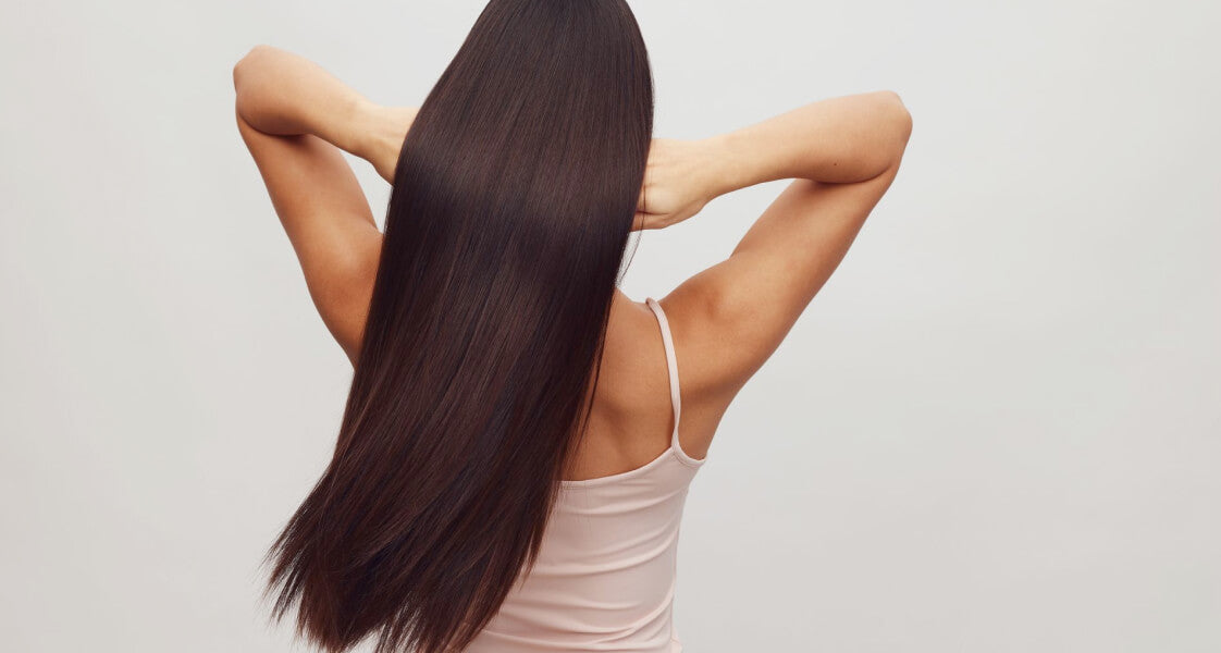 Woman with long, glossy, healthy shiny hair